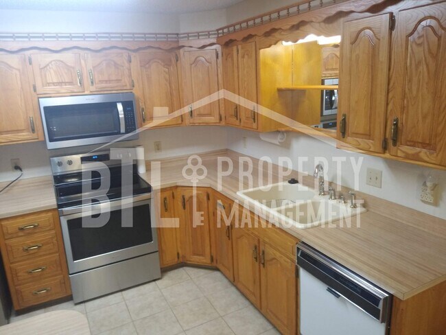 Building Photo - Condo by Lake with RV Spot!! 55+ Community