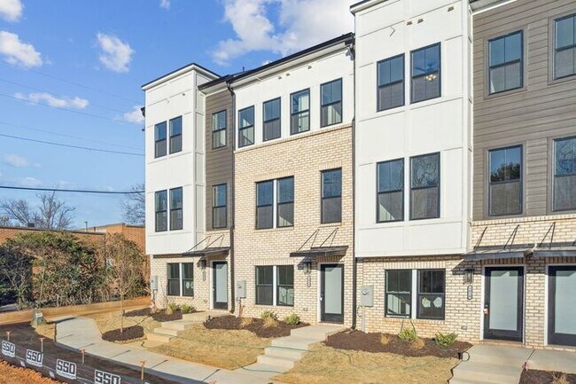 Building Photo - High-End 2BR Townhome | Rooftop Terrace + 2-Car Garage | 24-Unit Community