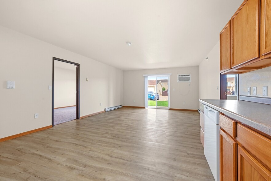 Step into the spacious interiors of Paramount at the Bluffs Apartments, featuring modern finishes and ample natural light. Enjoy a seamless blend of comfort and style in your new home. Schedule your tour today! - Paramount at the Bluffs Apartments