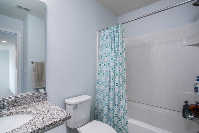 Building Photo - AWESOME 4 BDRM HOME IN GATED LEGACY PARK!