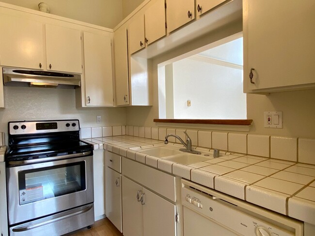 Building Photo - All-New Flooring - 2 Parking Spaces, Indoo...