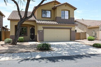 Building Photo - BRAND NEW 5 BEDROOM HOME IN PHOENIX
