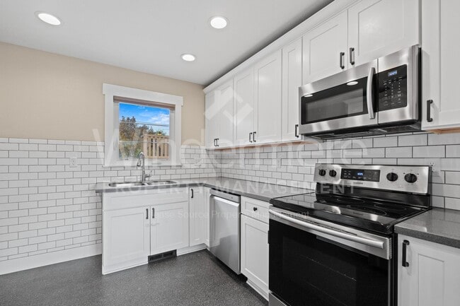 Building Photo - Bright, Charming Home with Modern Features and Exceptional Indoor–Outdoor Space Kendall Yards