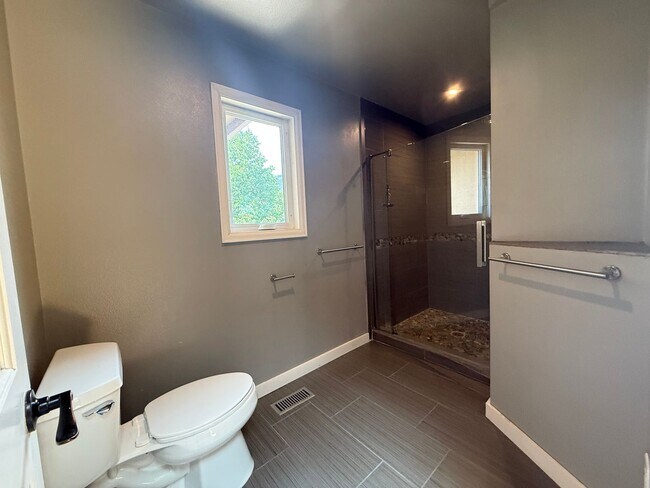 Building Photo - 5BD/4BA/3 car garage w Flat Yard Cheyenne ...