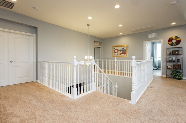 Building Photo - Stunning 4 bedroom 3.5 bath home with 3 ca...