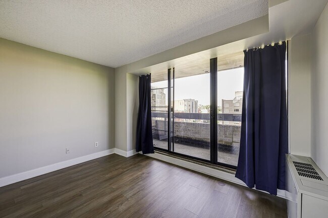 Building Photo - Two-level 2BR/2BA Condo with Balcony and Garage Parking