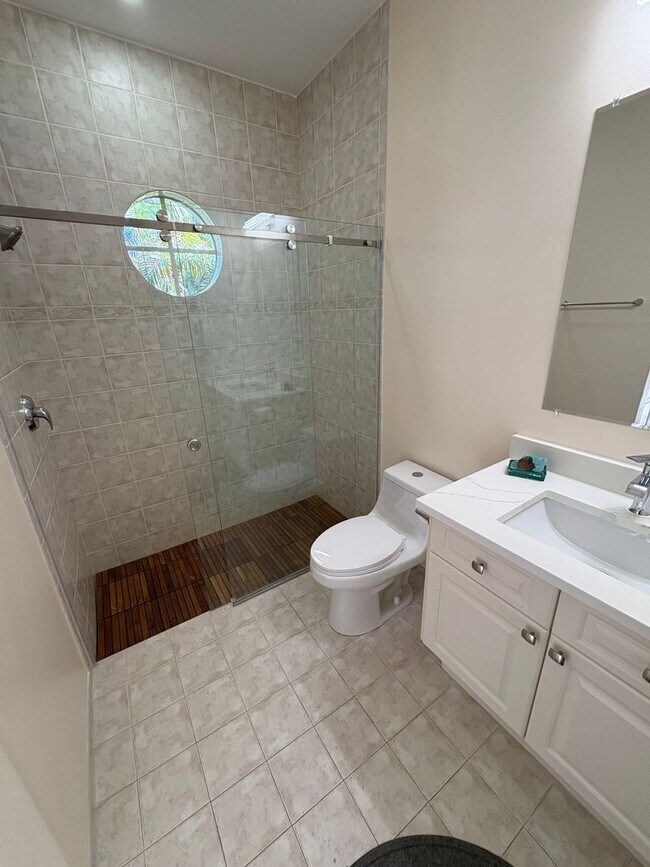 Building Photo - Spacious 3/3.5 3 car garage home in Palm City