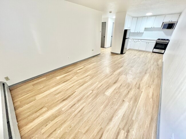 Experience modern living in this beautifully designed open space. - Melody Apartments