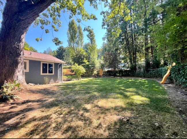 Building Photo - Updated Ranch with Large Fenced Yard, Tucked Off Walker Road~ Gas Fireplace~ Great Natural Light~...