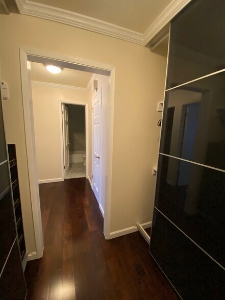 Hallway with Closets on both Sides - 4 Admiral Dr