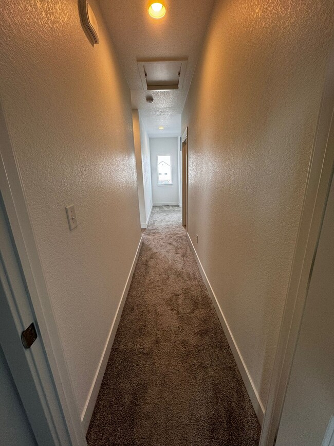 upstairs hallway - 21622 E 60th Ave