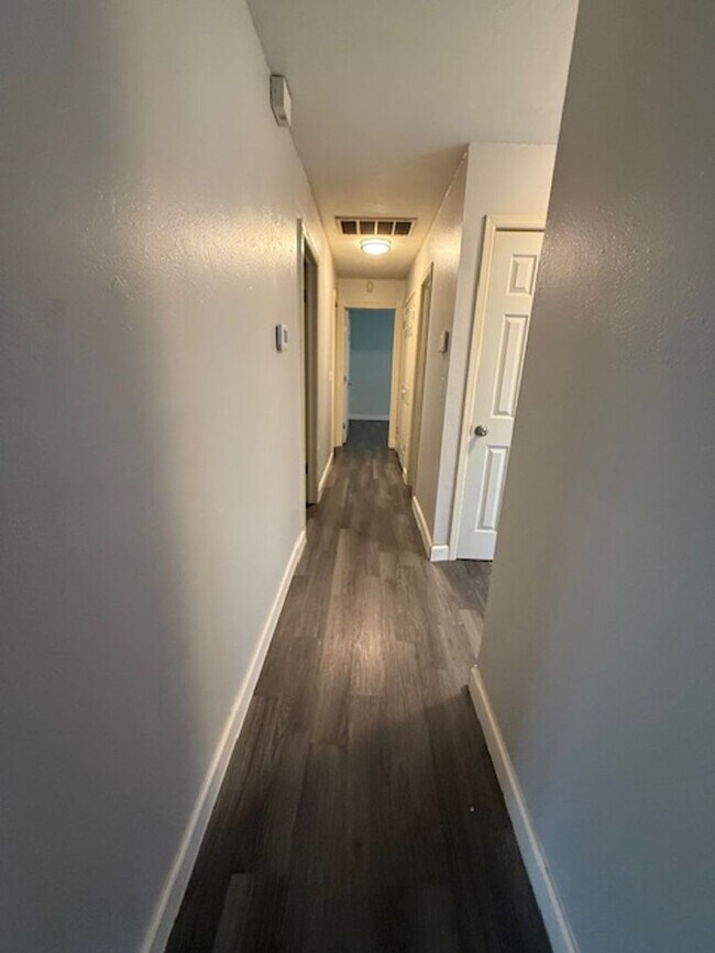 Building Photo - 3 bedrooms - 1.5 baths - Wood-look Floors ...