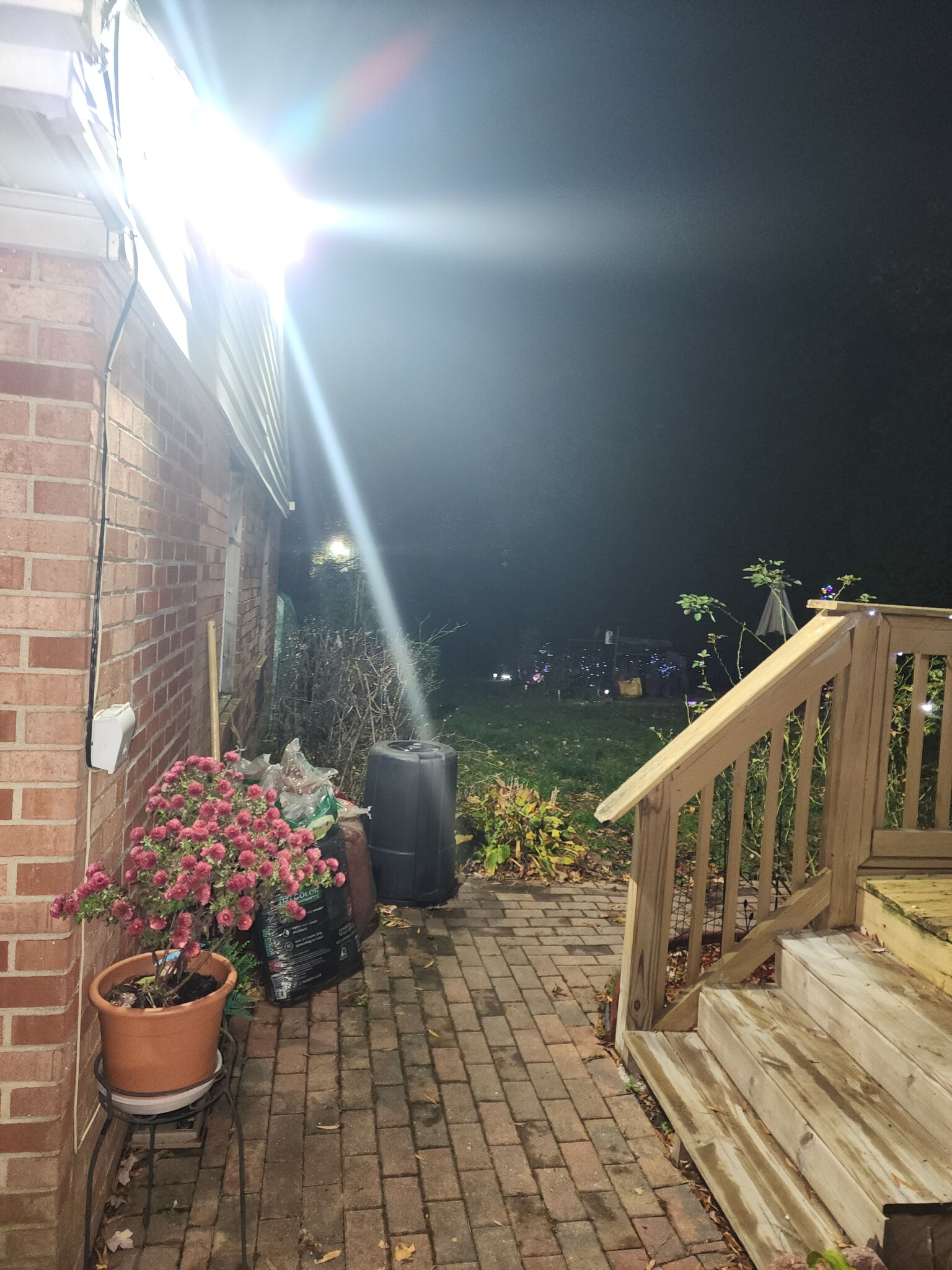 Inside gate entrance to backyard at night - 12809 E Shelby Ln