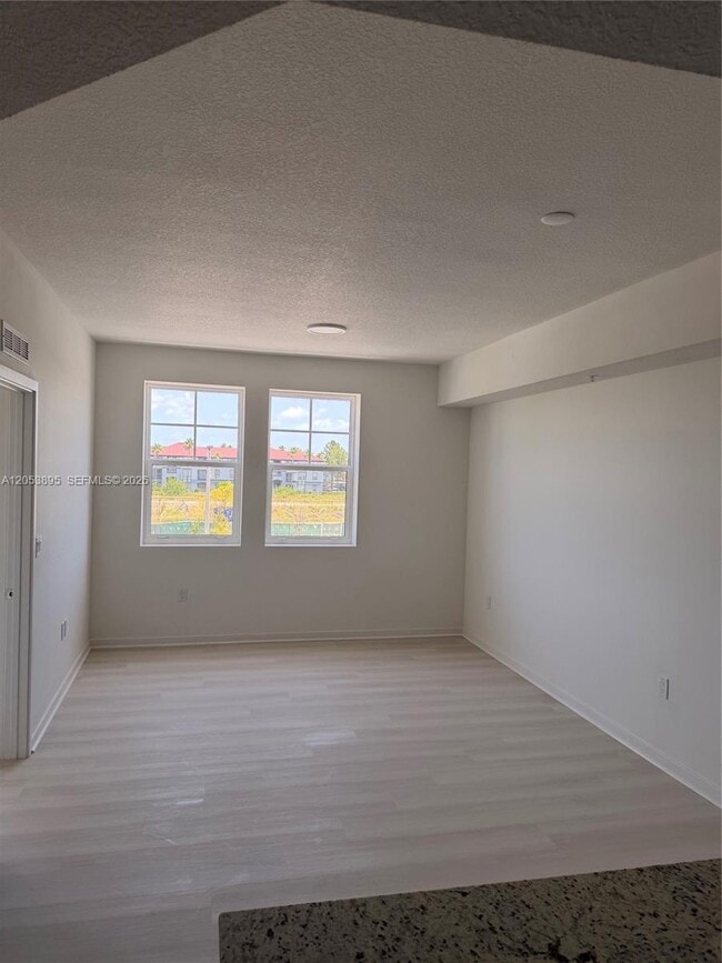 Building Photo - 5563 Millennia Park Dr