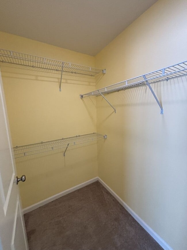 Building Photo - Gated Private Community! Spacious 3 Bedroom and 2.5 Bath End Unit Townhome