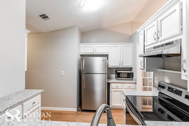 Building Photo - Come view this lovely home
