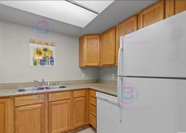 Building Photo - Incredible condo near UNR! This charming 2...
