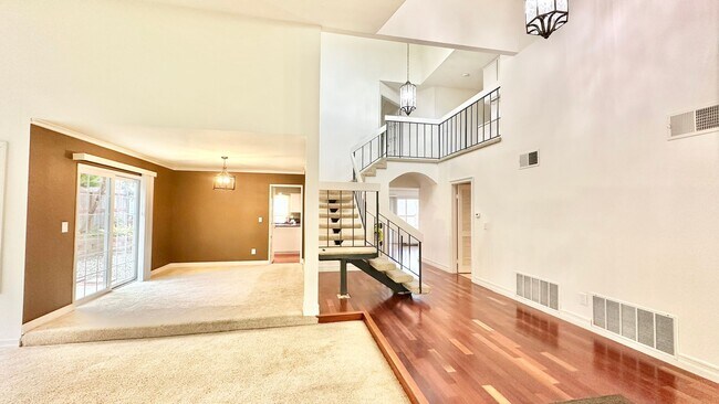 Building Photo - Spacious Two-Story Home with Three-Car Att...
