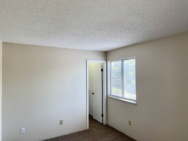 Building Photo - Updated Two Bed Townhome Nestled in the He...