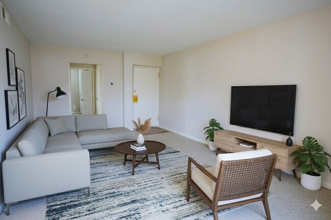 Woodmere 1 Bed Living Room - Woodmere Apartments
