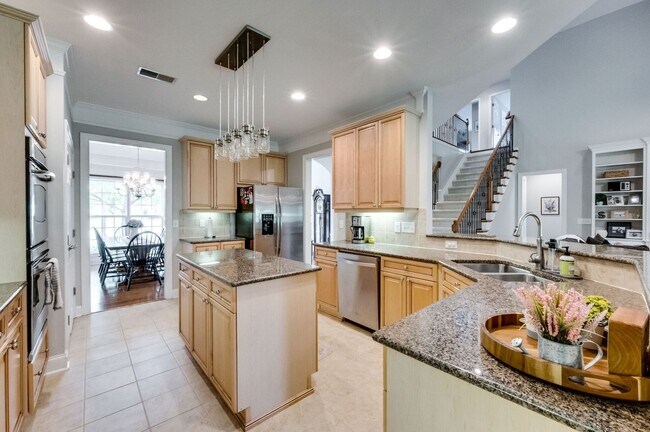 Building Photo - 4 Bedroom, 3.5 Bathroom Executive Home with Fenced Yard and 3 Car Garage.