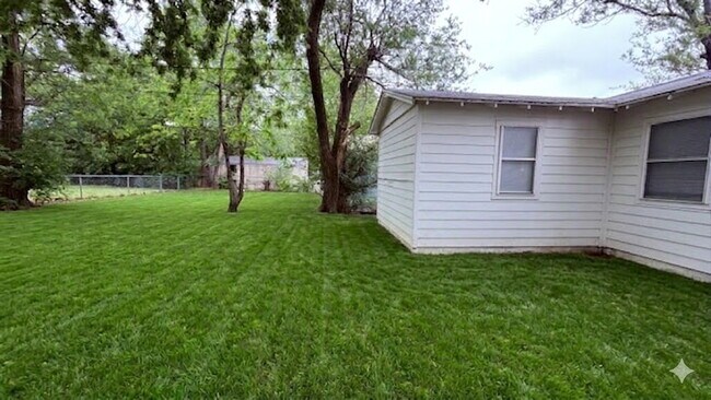Building Photo - Modern Living Meets Endless Outdoor Potential