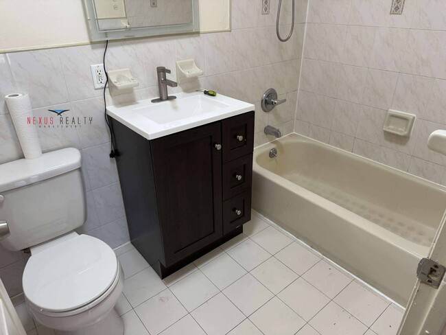 Building Photo - 34-39-39 69th St