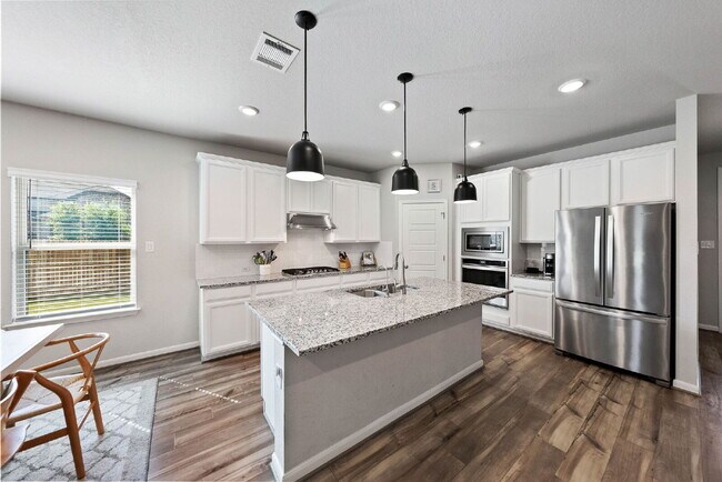 Building Photo - Stylish Corner Homesite on a Quiet Cul-de-...