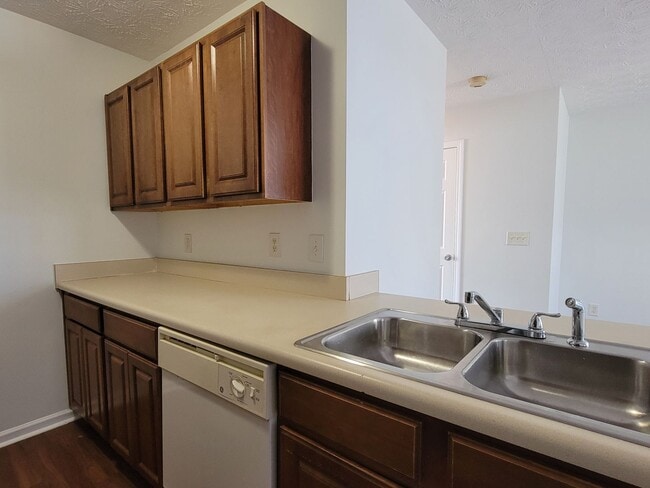 Building Photo - Experience modern living in this stunning two-story townhome! Awesome School District