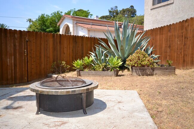 Backyard garden with suculents and fire pit - 3161 Weldon Ave