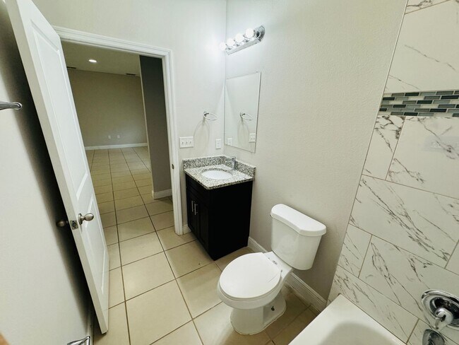 Building Photo - Spacious 4BR/2BA Home with Modern Upgrades – Rent Ready!!!