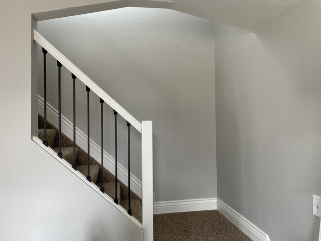 Stairs leading to master bedroom upstairs - 3375 Simmelink Loop