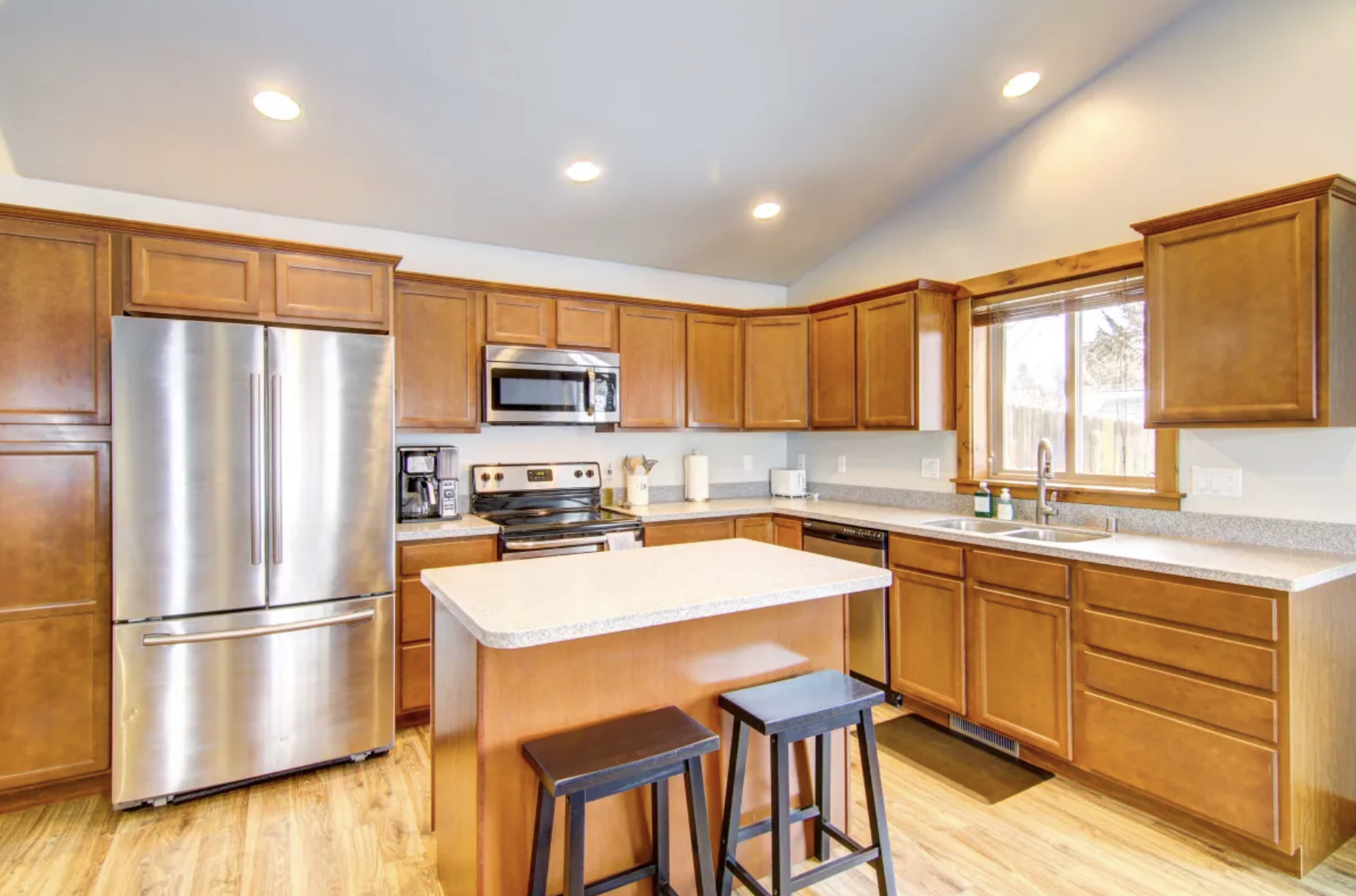 Fully equipped kitchen providing all the cooking basics so you can cook meals at home. - 91 E Rosebud Ave