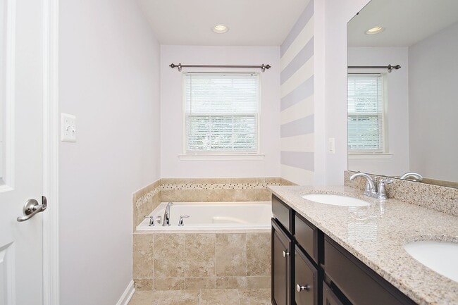 Building Photo - Pet-Friendly Townhome Minutes From NGIC, C...