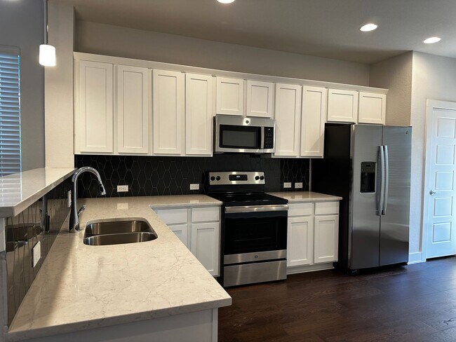 Building Photo - For Lease – Modern 2023 Condo Backing to G...