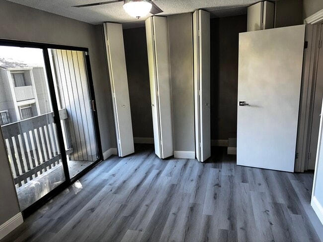 Building Photo - Charming 2-Bedroom Condo with Fireplace & ...