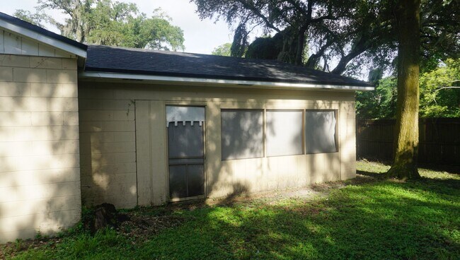 Building Photo - Four Bed - Three Bath - Large Storage Area...