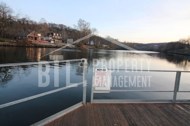 Building Photo - REDUCED PRICE! Fully Furnished One Bedroom...