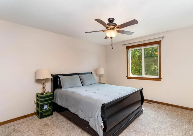 Building Photo - Modern 4BR Home with Fenced Yard + Garage ...
