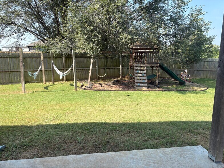 Swingset is included - 4208 SW Fieldstone Blvd
