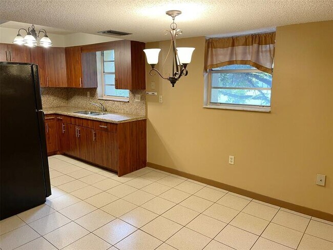 Building Photo - 11101 Royal Palm Blvd