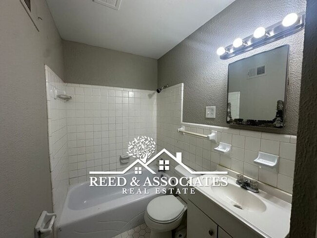 Building Photo - Spacious 4 Bedroom with Large Backyard!