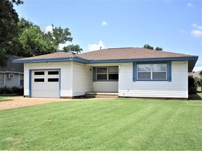 Building Photo - Covered Parking for 3 vehicles!
