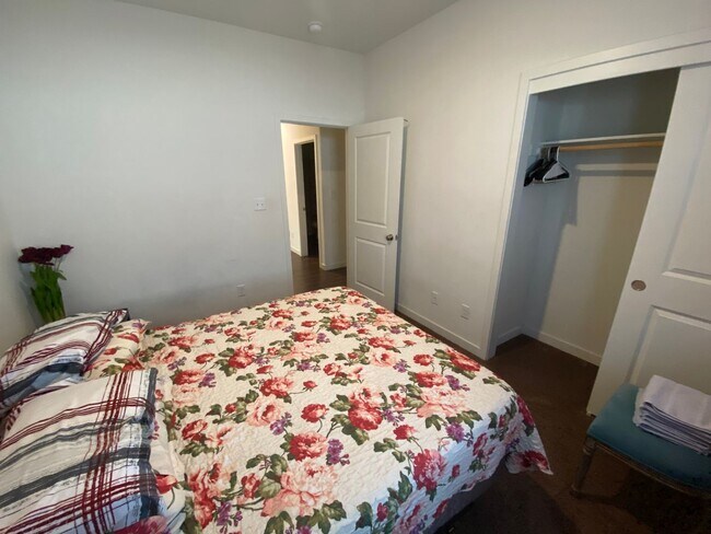 Building Photo - Welcome to the Best Deal in Town. Fully furnished 4 BD 2 BA house on a corner lot