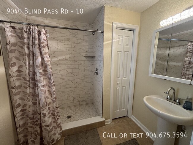 Building Photo - 9040 Blind Pass Rd
