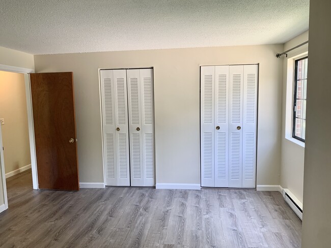 newly painted wall and closet door - 390 Great Rd