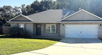 Building Photo - Just like New 3/2 - Custom Quality Constru...