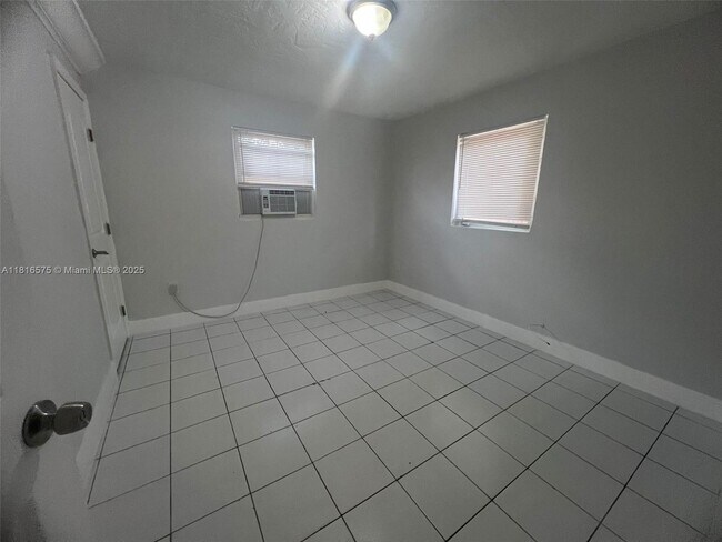 Building Photo - 1275 NW 60th St