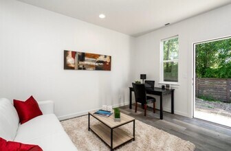 Building Photo - 3-Story Urban Walk Up at a Modern Communit...