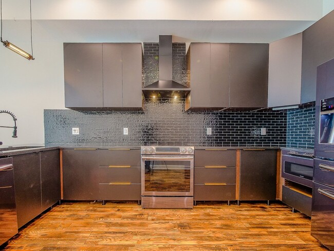 Building Photo - Three Bedroom Modern Olde Kensington Condo with Roofdeck